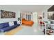 Studio apartment bedroom with orange bedding and built-in shelving at 2870 Pharr Court S Nw # 2703, Atlanta, GA 30305