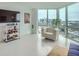 Modern living room with city views and hardwood floors at 2870 Pharr Court S Nw # 2703, Atlanta, GA 30305