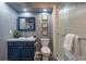 Basement bathroom with a navy blue vanity and walk-in shower at 515 Anthony Pl, Canton, GA 30114