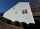 Side view of house showing vinyl siding and deck at 138 Shady View Pl, Lawrenceville, GA 30044