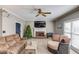 Living room featuring a fireplace and large windows at 1750 Terrace Lake Dr, Lawrenceville, GA 30043