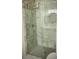 Modern bathroom with a frameless glass shower and marble tile at 316 Henry Aaron Sw Ave, Atlanta, GA 30310