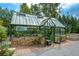 Large greenhouse with brick base and ample growing space at 650 Hemlock Trl, Canton, GA 30114