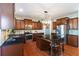 Modern kitchen with stainless steel appliances and granite countertops at 645 Wexford Ct, Acworth, GA 30102