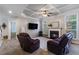 Living room with fireplace and coffered ceiling at 645 Wexford Ct, Acworth, GA 30102