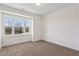 Bright bedroom with large bay window and plush carpeting at 310 Mcdonough Se Blvd # 103, Atlanta, GA 30315