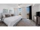 Spacious bedroom with king-size bed and city view at 2870 Pharr Court South Nw # 2602, Atlanta, GA 30305