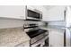 Stainless steel appliances in modern kitchen at 2870 Pharr Court South Nw # 2602, Atlanta, GA 30305