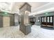 Elegant lobby with marble floors and display cases at 2870 Pharr Court South Nw # 2602, Atlanta, GA 30305