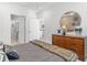 Spacious bedroom with dresser and large bed, offering ample closet space at 392 Pratt Se Dr # 2023, Atlanta, GA 30315