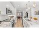 Modern kitchen with white cabinets, stainless steel appliances, and an island at 392 Pratt Se Dr # 2023, Atlanta, GA 30315