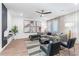 Spacious living room features a comfortable sectional sofa, stylish armchairs, and large-scale art at 392 Pratt Se Dr # 2023, Atlanta, GA 30315