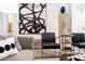 Elegant living room showcasing modern armchairs and abstract art at 392 Pratt Se Dr # 2023, Atlanta, GA 30315
