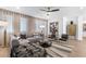 Open and airy living room with sectional sofa and modern accents at 392 Pratt Se Dr # 2023, Atlanta, GA 30315