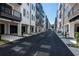 Row of townhouses with attached garages and landscaped courtyard at 392 Pratt Se Dr # 2023, Atlanta, GA 30315