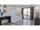 Bedroom with daybed, desk, and access to balcony at 1280 W Peachtree Nw St # 914, Atlanta, GA 30309