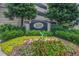 1280 West Condominium entrance with landscaped flower bed at 1280 W Peachtree Nw St # 914, Atlanta, GA 30309