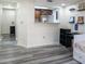 Kitchen view from living area with wood cabinets at 1280 W Peachtree Nw St # 914, Atlanta, GA 30309
