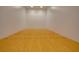 Indoor racquetball court with wood flooring and white walls at 1280 W Peachtree Nw St # 914, Atlanta, GA 30309