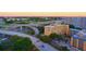 Aerial view of a multi-story building near a highway interchange at 215 Piedmont Ne Ave # 1905, Atlanta, GA 30308