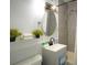 Modern bathroom with gray tile, updated vanity, and stylish fixtures at 215 Piedmont Ne Ave # 1905, Atlanta, GA 30308