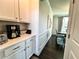 Bright breakfast nook with white cabinets and quartz countertops at 7860 Bristol Valley Dr, Cumming, GA 30028