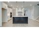 Bright kitchen with a center island and modern appliances at 5123 Goldsberry Ln, Mableton, GA 30126