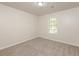 Bright bedroom with carpet and window at 894 Churchill Ct, Stone Mountain, GA 30083
