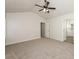 Main bedroom with carpet, ceiling fan and en-suite bathroom at 894 Churchill Ct, Stone Mountain, GA 30083