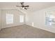 Spacious bedroom with carpet and ceiling fan at 894 Churchill Ct, Stone Mountain, GA 30083