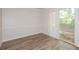 Bright dining room with hardwood floors and sliding glass door at 894 Churchill Ct, Stone Mountain, GA 30083