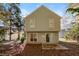 Back of house with sliding glass door to patio at 894 Churchill Ct, Stone Mountain, GA 30083