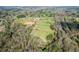 Aerial view of West Creek Stables and surrounding land at 2431 Perkerson Mill Rd, Austell, GA 30106