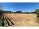 Equestrian arena with jumps and obstacles, ready for riding at 2431 Perkerson Mill Rd, Austell, GA 30106