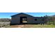Open-air barn structure, ideal for equipment or additional storage at 2431 Perkerson Mill Rd, Austell, GA 30106