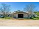 Spacious barn with multiple stalls and large doors at 2431 Perkerson Mill Rd, Austell, GA 30106