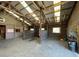 Spacious barn aisle with multiple horse stalls at 2431 Perkerson Mill Rd, Austell, GA 30106