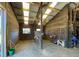 Barn with multiple stalls, tack room, and bright lighting at 2431 Perkerson Mill Rd, Austell, GA 30106