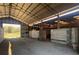 Open barn with several stalls and dirt floor at 2431 Perkerson Mill Rd, Austell, GA 30106