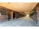 Long barn aisle with multiple horse stalls at 2431 Perkerson Mill Rd, Austell, GA 30106
