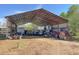 Spacious metal barn houses farm equipment, vehicles, and storage at 2431 Perkerson Mill Rd, Austell, GA 30106