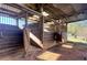 Multiple outdoor horse stalls with individual spaces and shaded areas at 2431 Perkerson Mill Rd, Austell, GA 30106