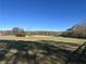 Large open pasture with distant trees at 2431 Perkerson Mill Rd, Austell, GA 30106