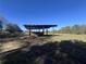 Open-air shelter for horses in the pasture at 2431 Perkerson Mill Rd, Austell, GA 30106