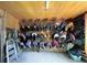 Organized tack room with numerous saddles, bridles, and other riding equipment at 2431 Perkerson Mill Rd, Austell, GA 30106
