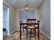 Small breakfast nook with a table and four chairs at 8432 Browns Mill Trce, Stonecrest, GA 30038