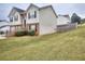 Two story home with brick and siding, steps and yard at 8432 Browns Mill Trce, Stonecrest, GA 30038