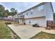 Back exterior showcasing a deck and patio at 8432 Browns Mill Trce, Stonecrest, GA 30038