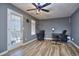 Home office with desk, two chairs, and exterior access at 8432 Browns Mill Trce, Stonecrest, GA 30038