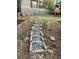Landscaped backyard with stone steps leading to a grassy area at 2852 Caraway Dr, Tucker, GA 30084